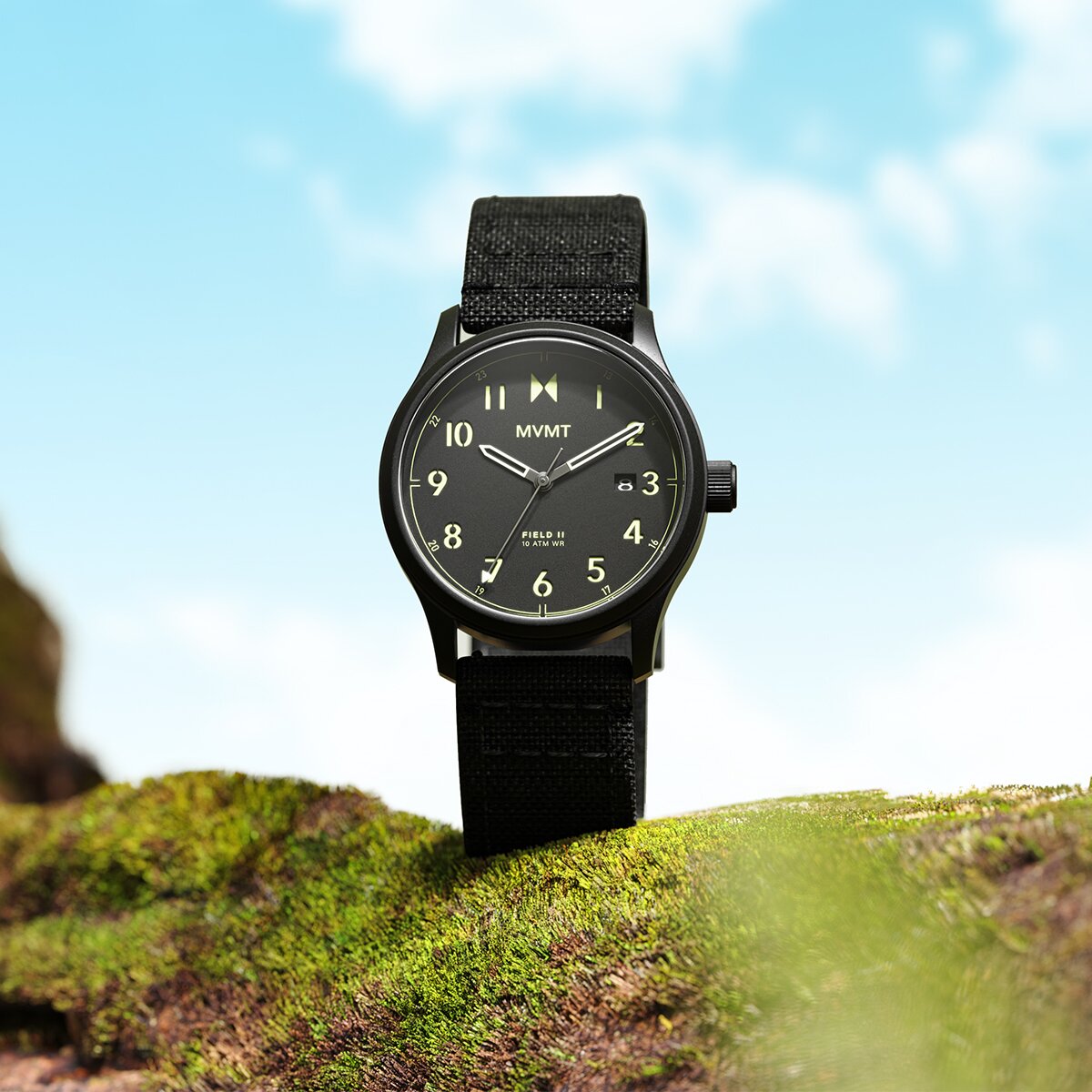 Men's Field II solar watch with black strap with a sky background