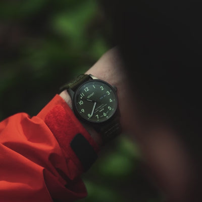 Video of a man in a red jacket wearing the Field Automatic watch