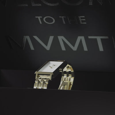 Rotating rectangular two-tone bracelet watch, transitioning between full-product views and close-ups of the dial, crown and MVMT logo.